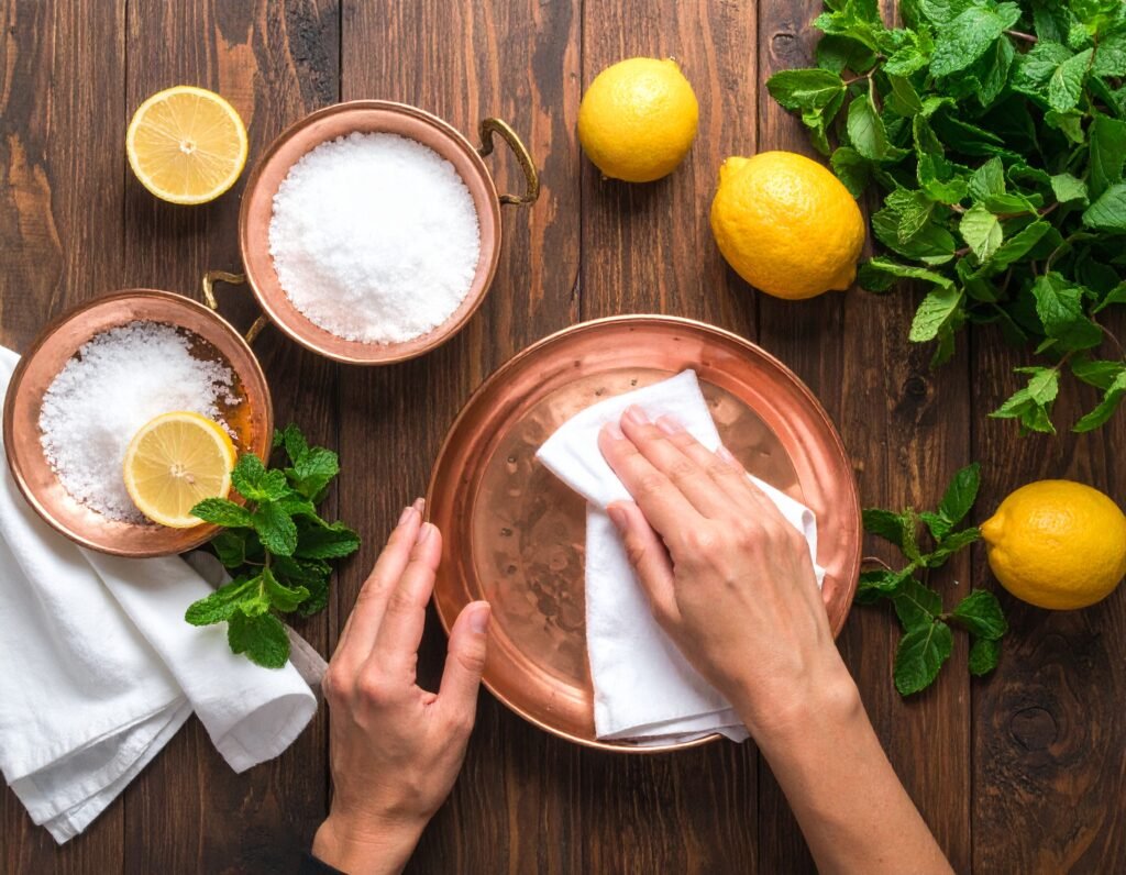 _flat lay Natural copper cleaning with lemon and salt on a rustic wooden table___ 362069