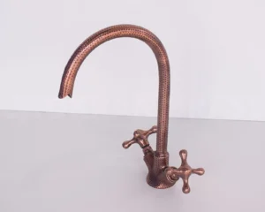 Copper bathroom hook being cleaned with lemon juice
