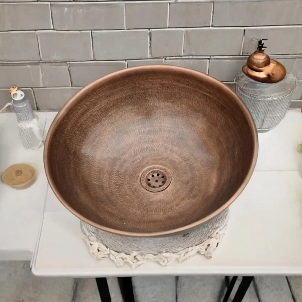 Removing tarnish from copper faucet using lemon and salt